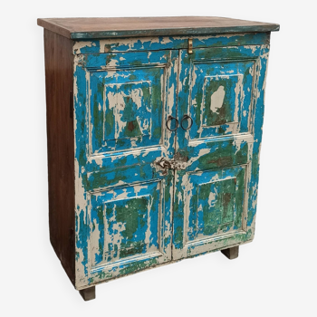 Small old blue wooden chest of drawers with two doors