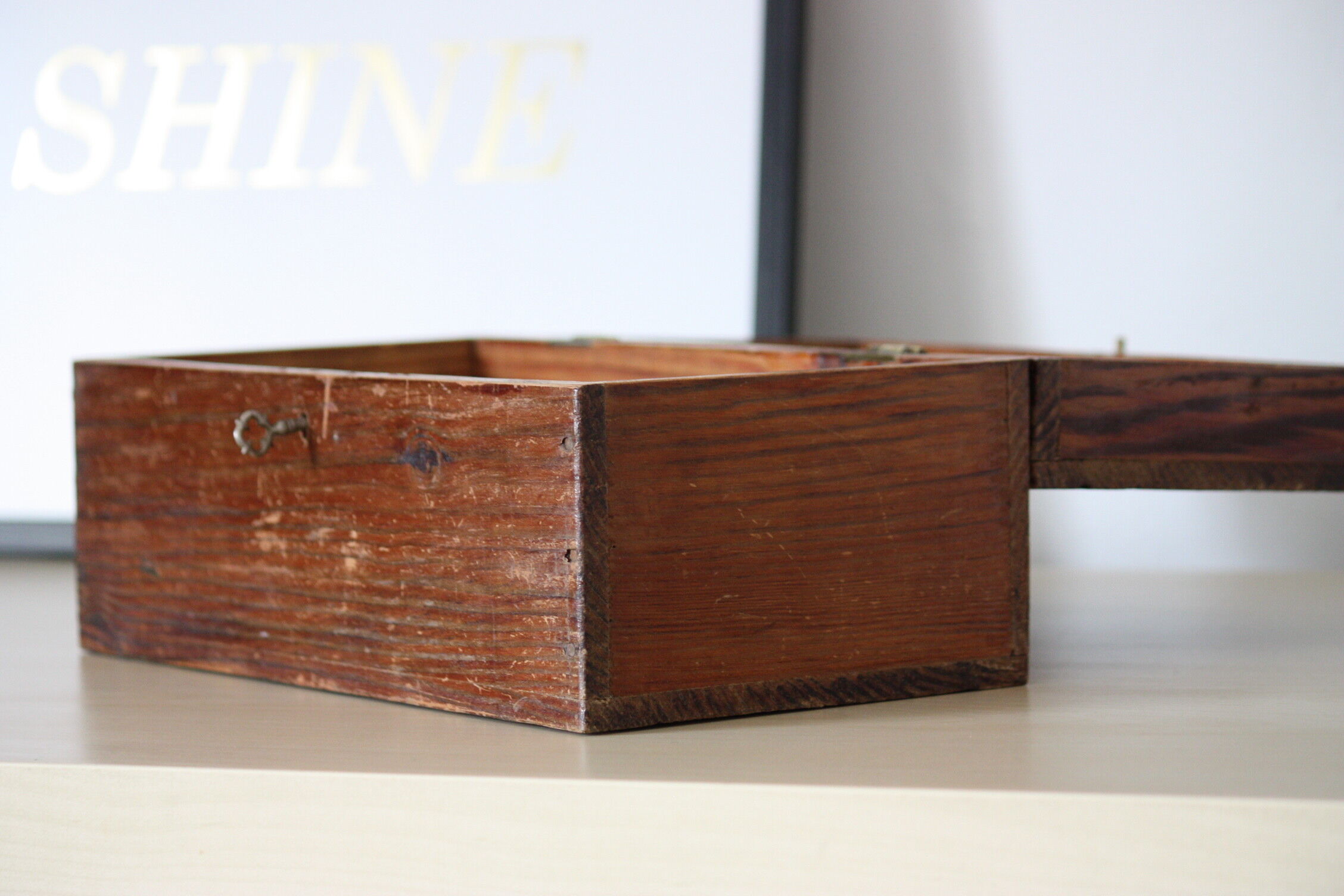 Carved wooden box with lock