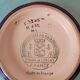Numbered hollow dish in Longwy emaux.