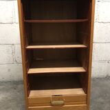 Vintage curtain-shaped binder in light honey-coloured oak