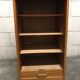 Vintage curtain-shaped binder in light honey-coloured oak
