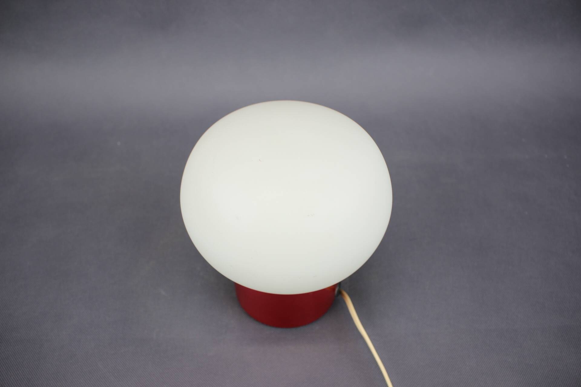 Burgundy Red opaline glass table lamp from the 1970s space age.