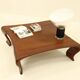 Table basse en Iroko massif par Marc Van Rampelberg