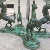 Coffee table with glass plate and bronze horses