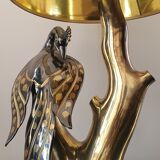 Peacock laying lamp by Willy Daro, 1970.