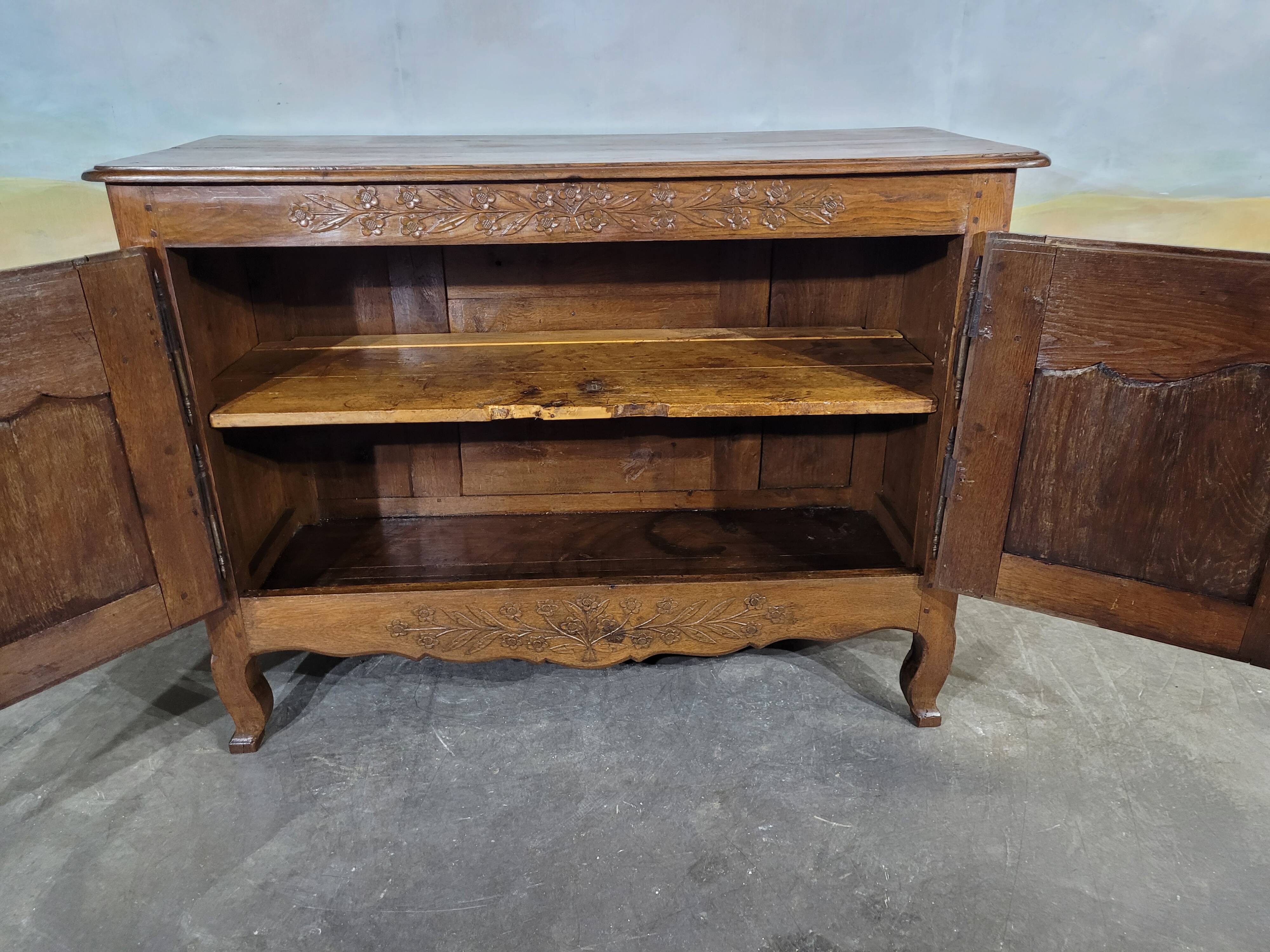 Low Norman sideboard carved in 19th century oak