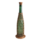 Glass and wicker bottle