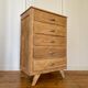 Vintage chiffonier with compass feet