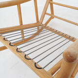 Scandinavian modern birch spindle rocking lounge chair, 1960’s