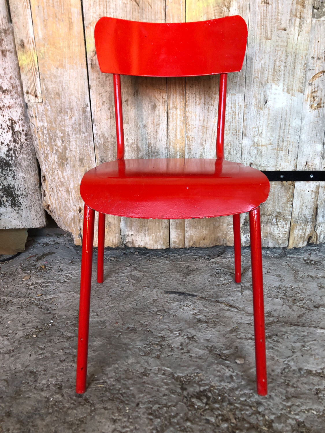 Set of 4 red metal chairs