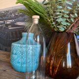 Antique glass bottle with a capacity of 1 litre and its beige cap - in very good condition!