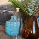 Antique glass bottle with a capacity of 1 litre and its beige cap - in very good condition!