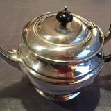 Coffee and the service in silver metal flagship