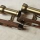 Pair of brass spots and wooden base year 70