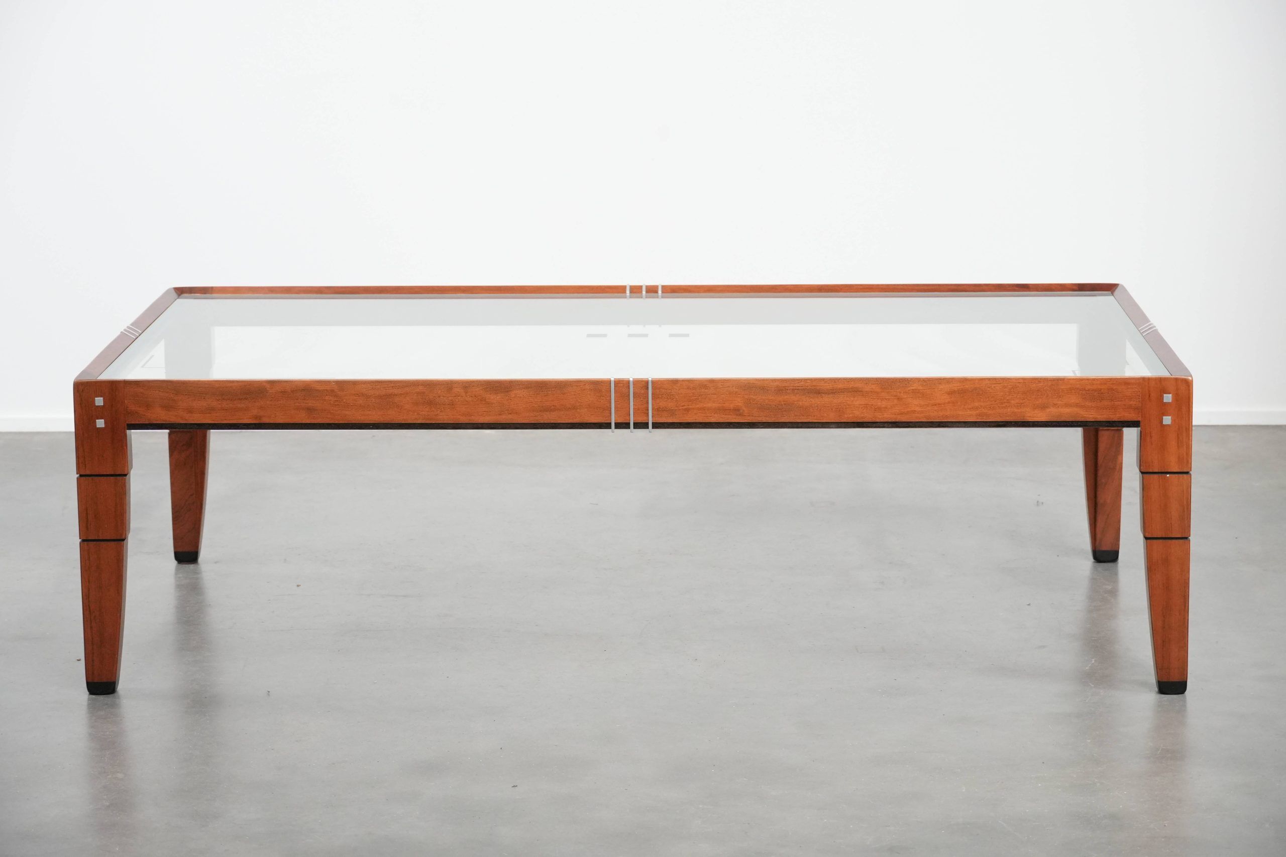 Beautiful Art Deco design coffee table with a glass top