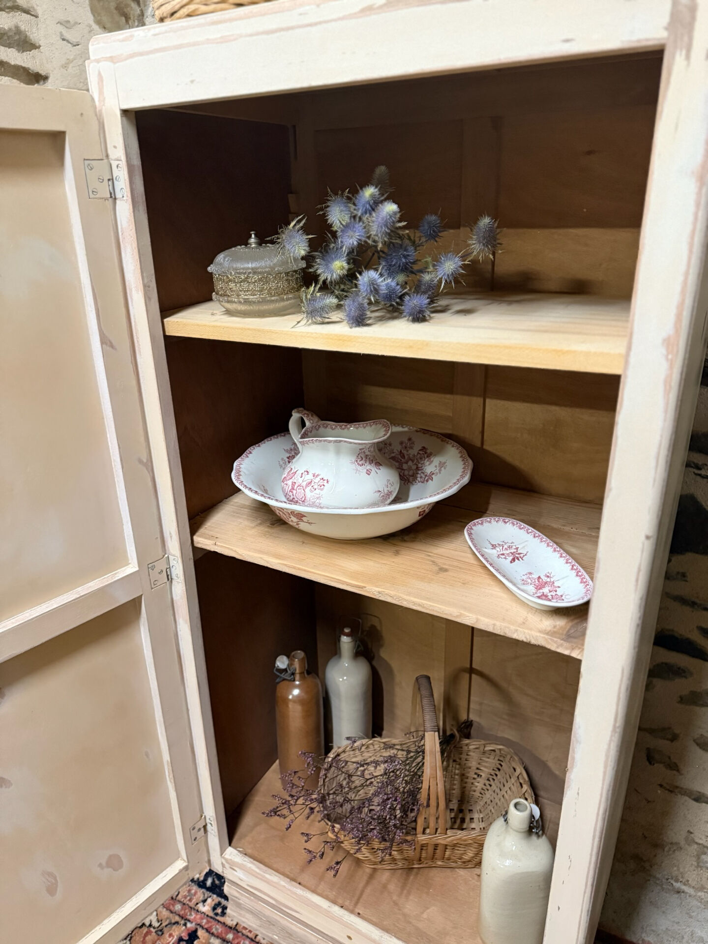 Small one-door Art Deco cabinet with a patina.