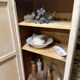 Small one-door Art Deco cabinet with a patina.