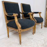 Pair of 19th century Louis XVI gilt armchairs newly re upholstered in holland and sherry fabric