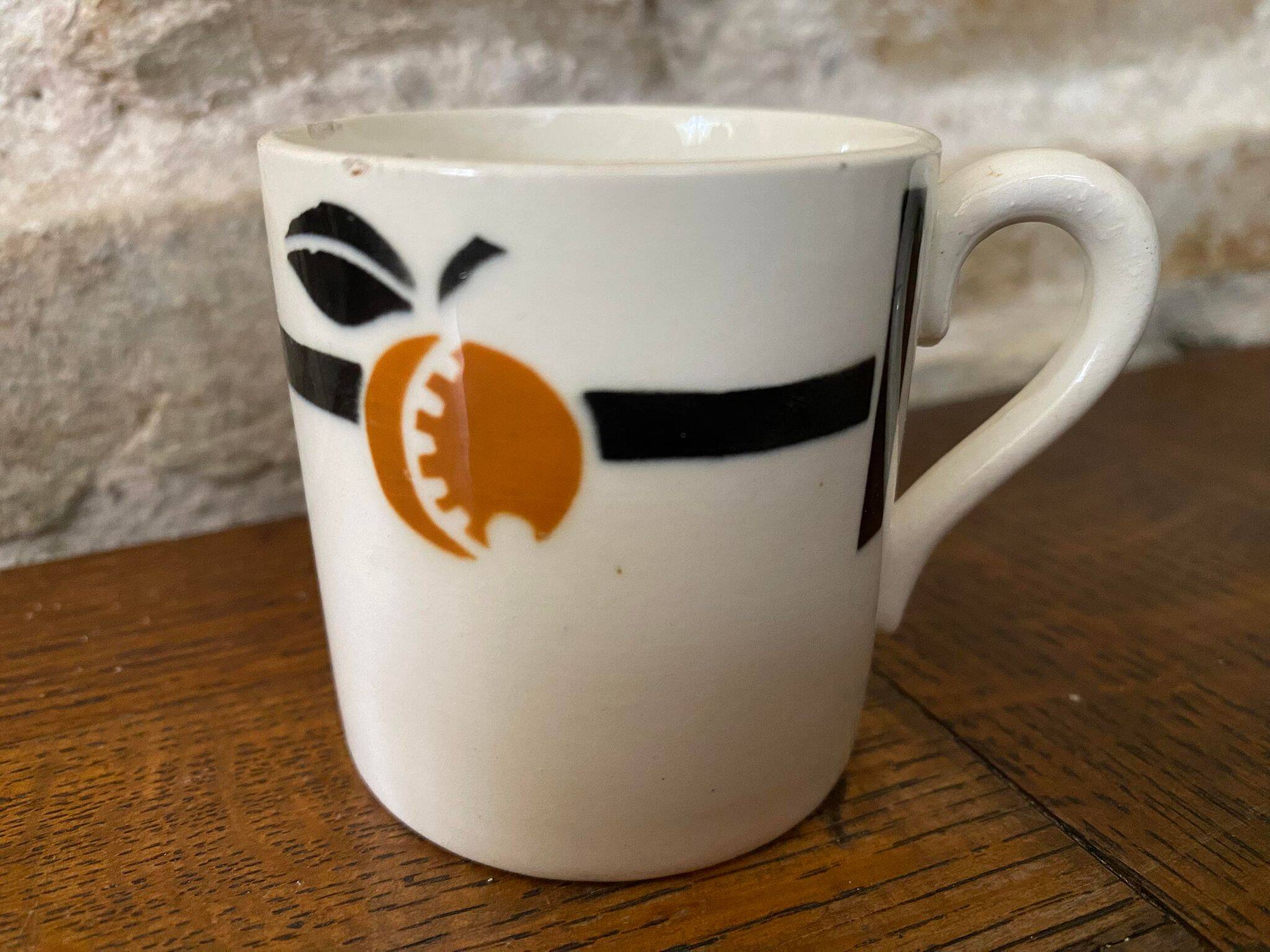 Cup and saucer in Iron Earth Badonviller apricot décor