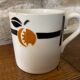 Cup and saucer in Iron Earth Badonviller apricot décor