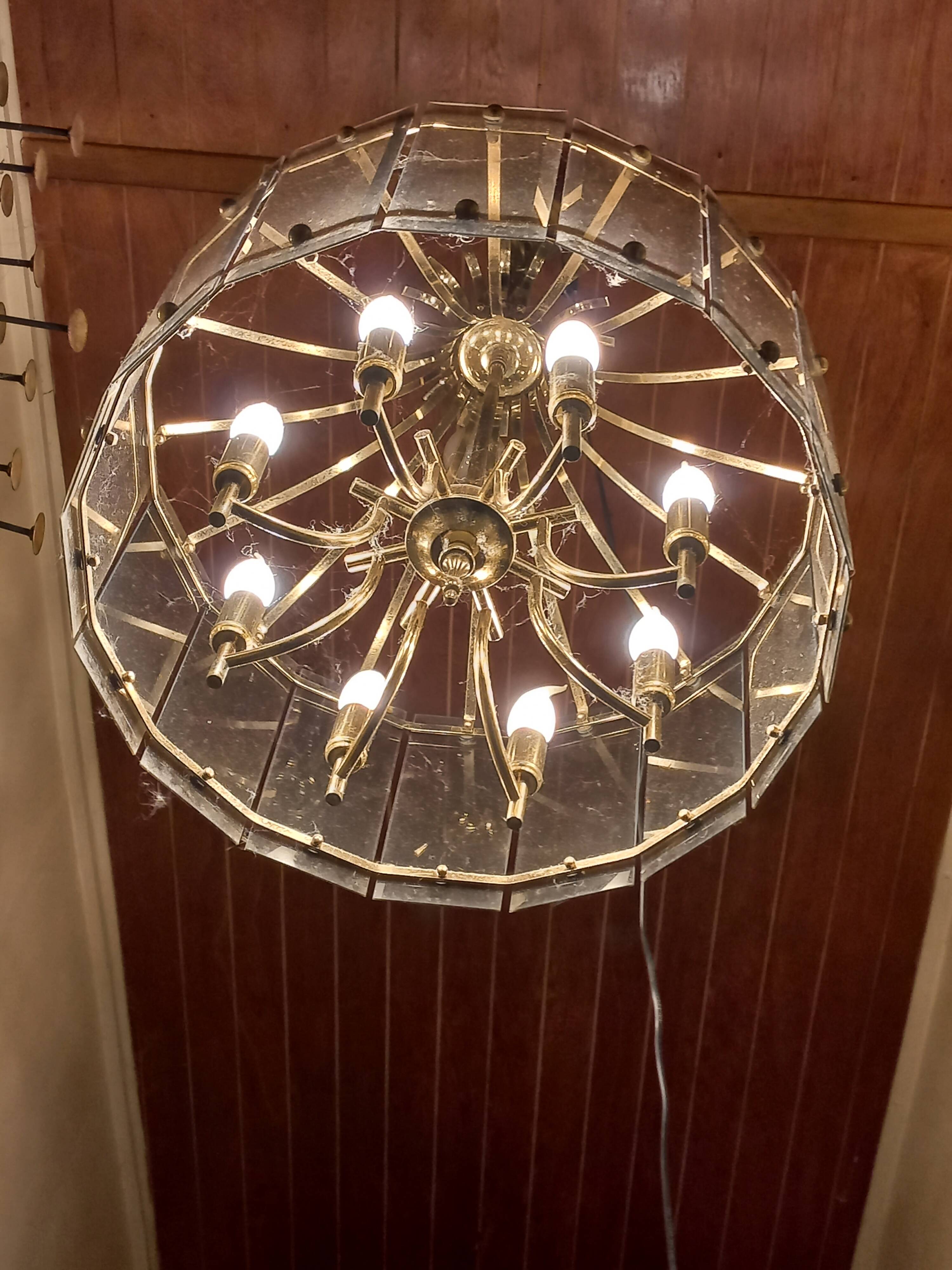70s designer chandelier with smoked glass plates and gold metal frame