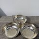 Silver-plated metal dish topped with an acorn