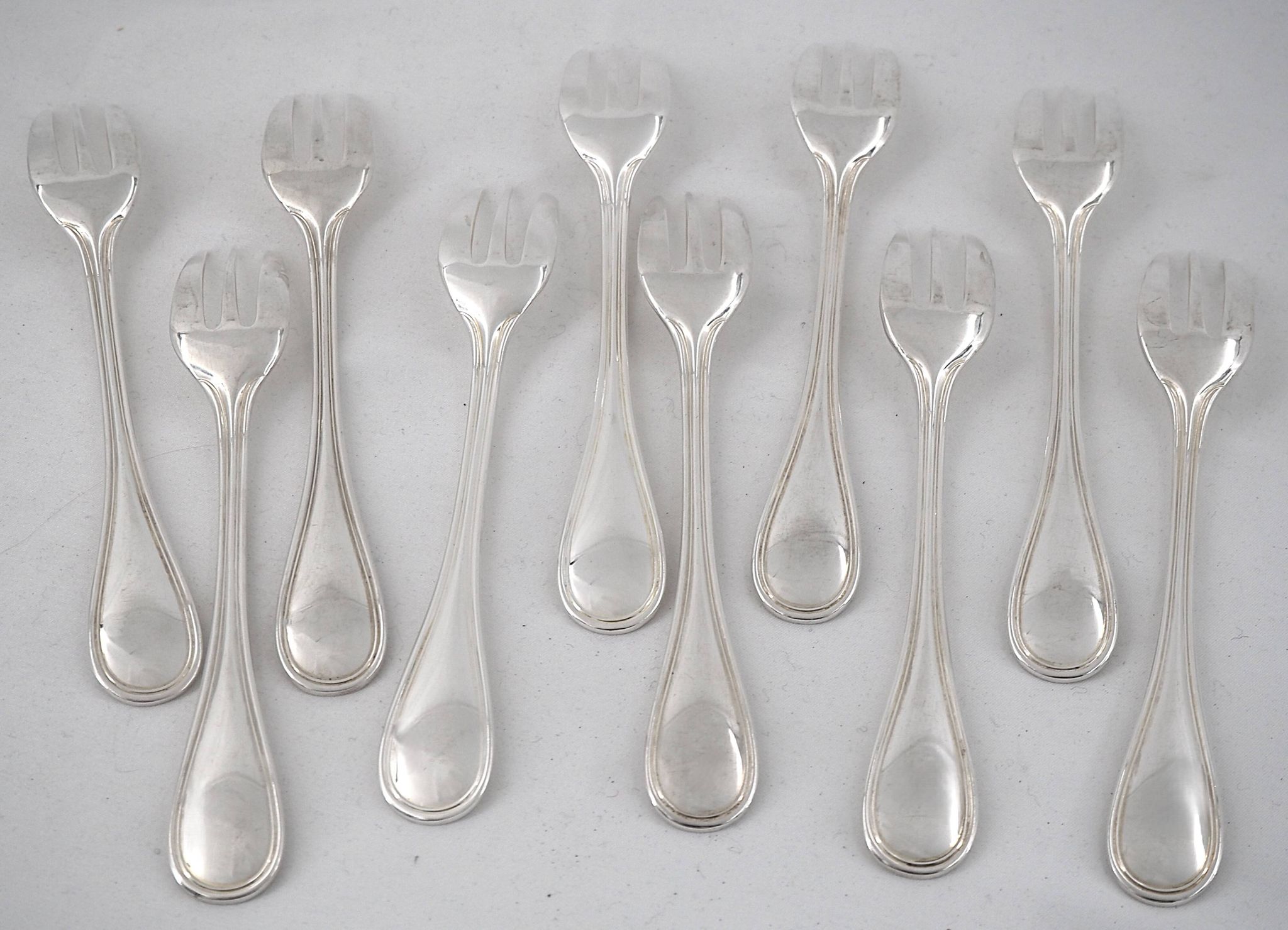 Christofle Albi, 10 silver-plated cake forks, excellent condition.