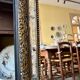 Rectangular Napoleon III mirror in moulded black and gold wood with engraved mirror decoration.