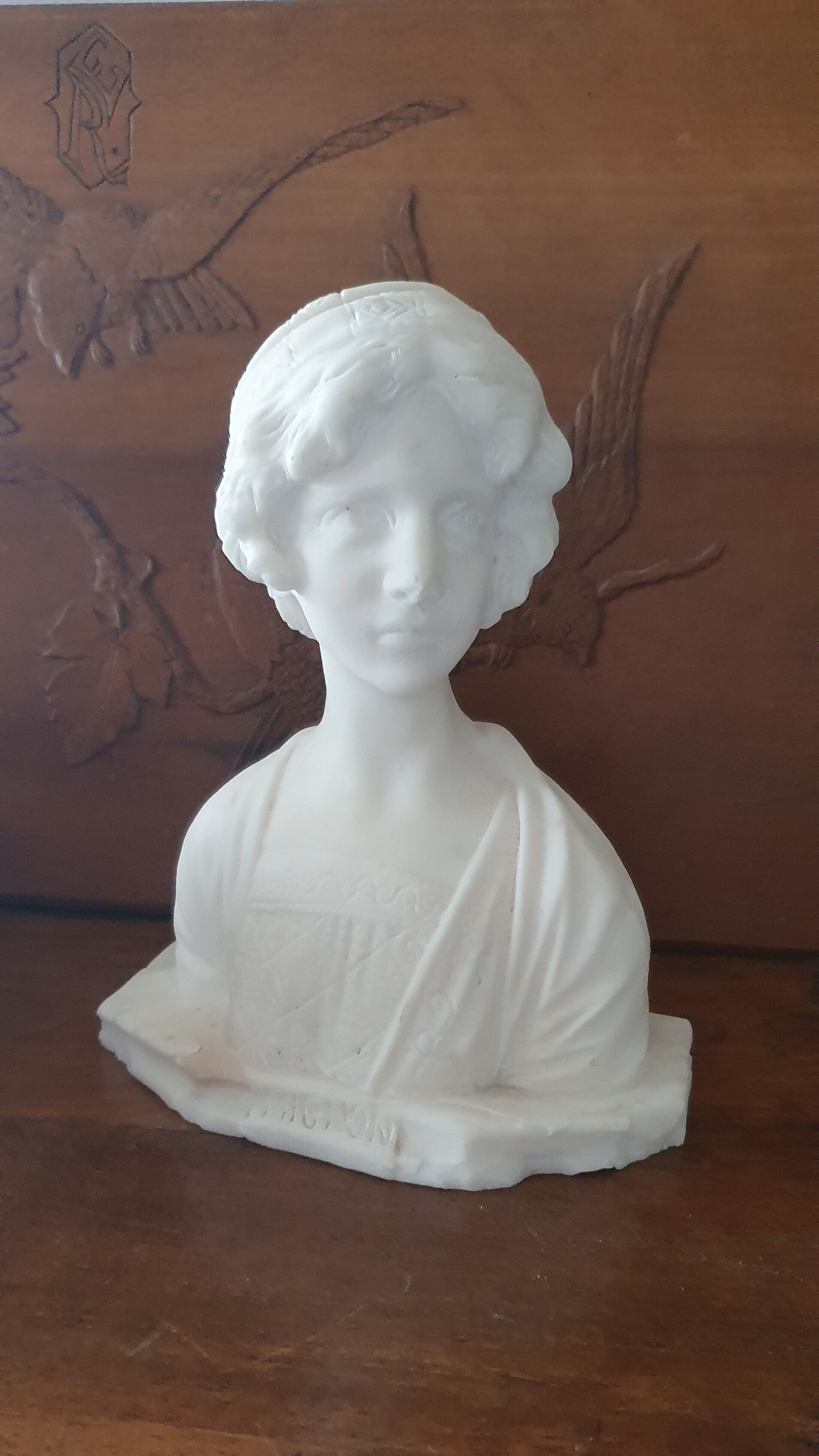 Bust of young woman L.Mignon