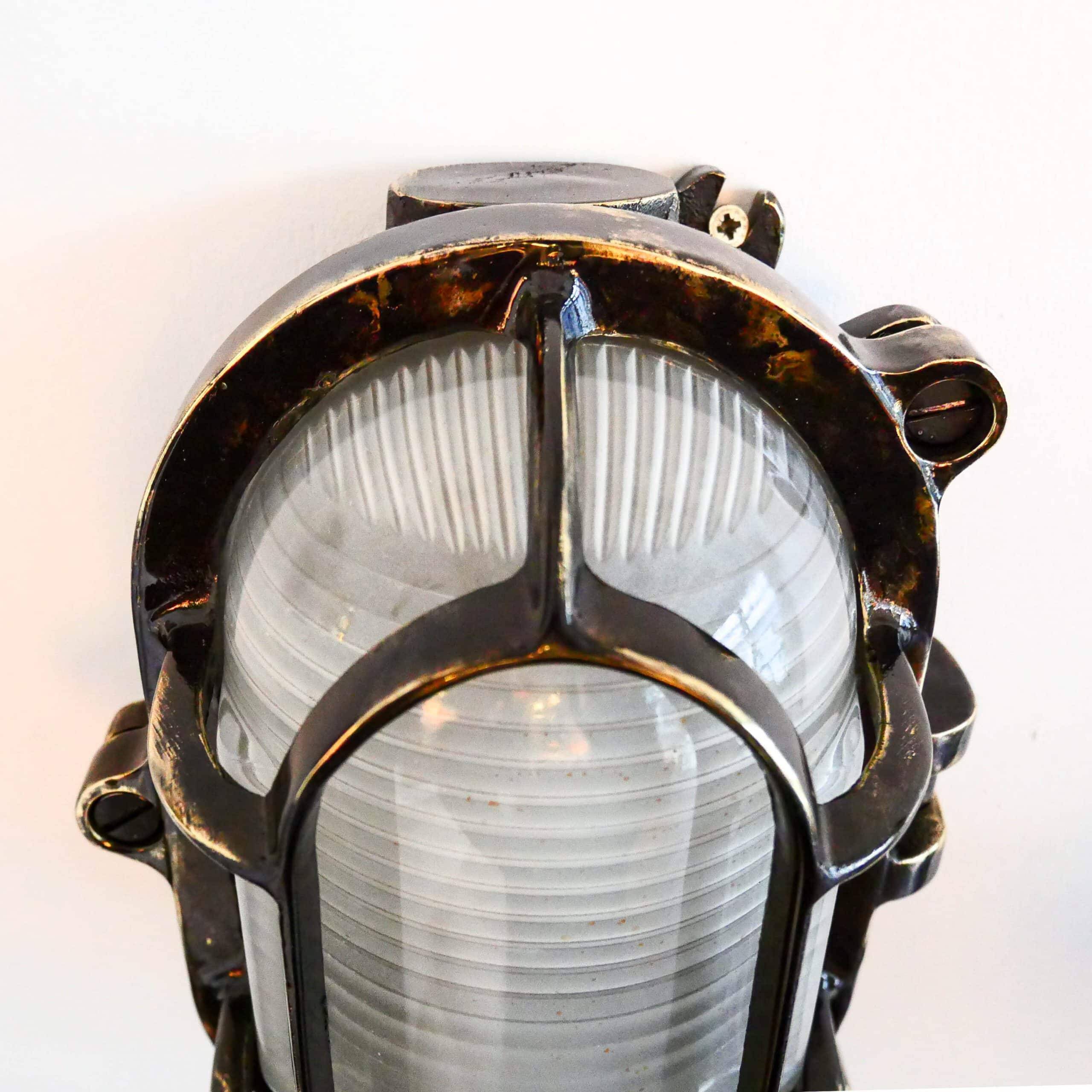 Antique Holophane wall lamp in patinated bronze