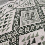Tapis blanc et vert tissé mains