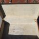 Old travel trunk made of wood and brass