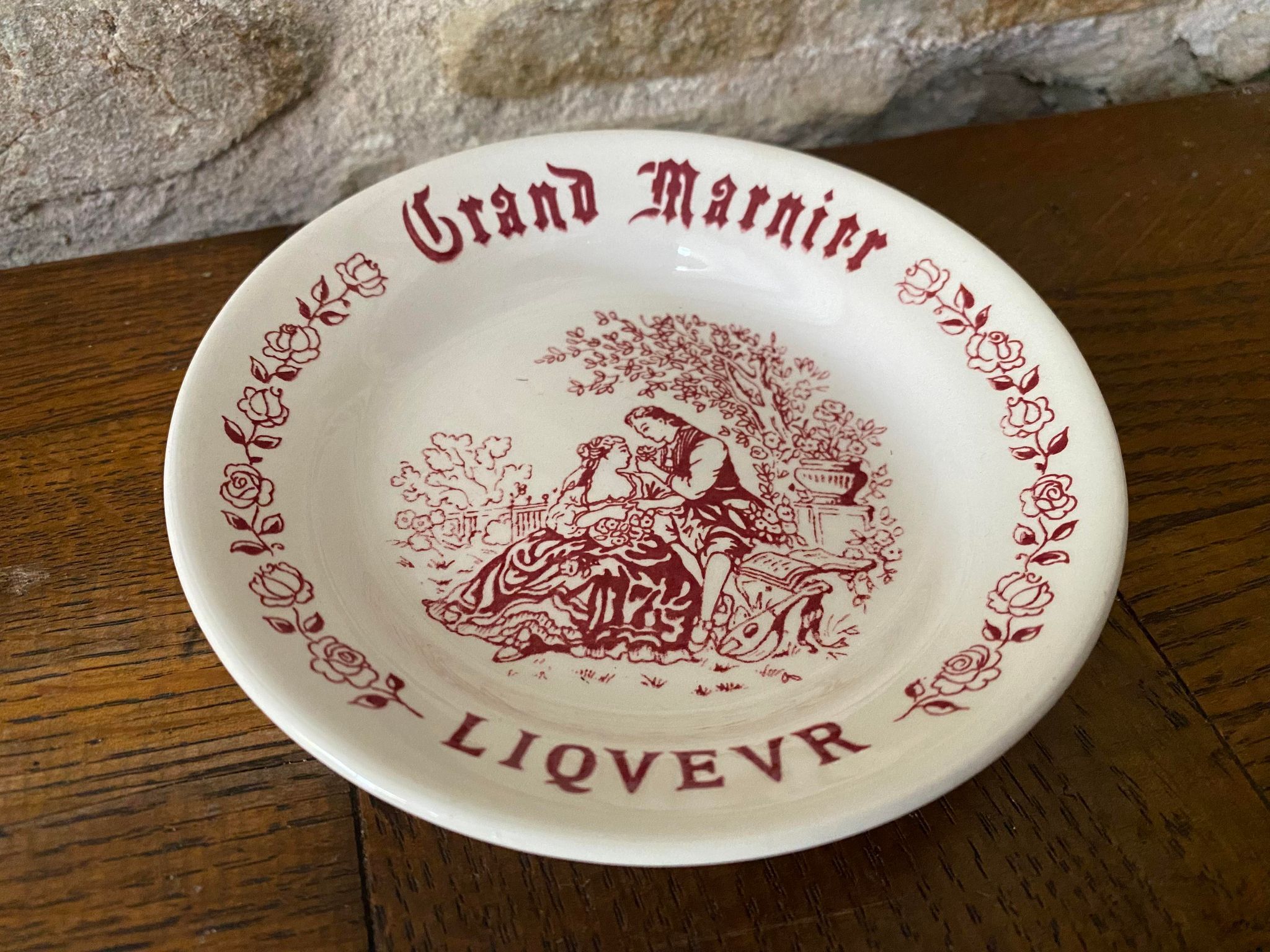 Grand Marnier Liqueur ashtray with marquis and marquise decoration
