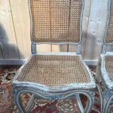 Suite de 4 chaises cannées de style Louis XV rechampi