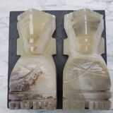 Onyx book clambands depicting an Aztec statue