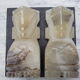 Onyx book clambands depicting an Aztec statue