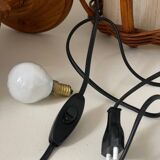 Turned wood lamp.