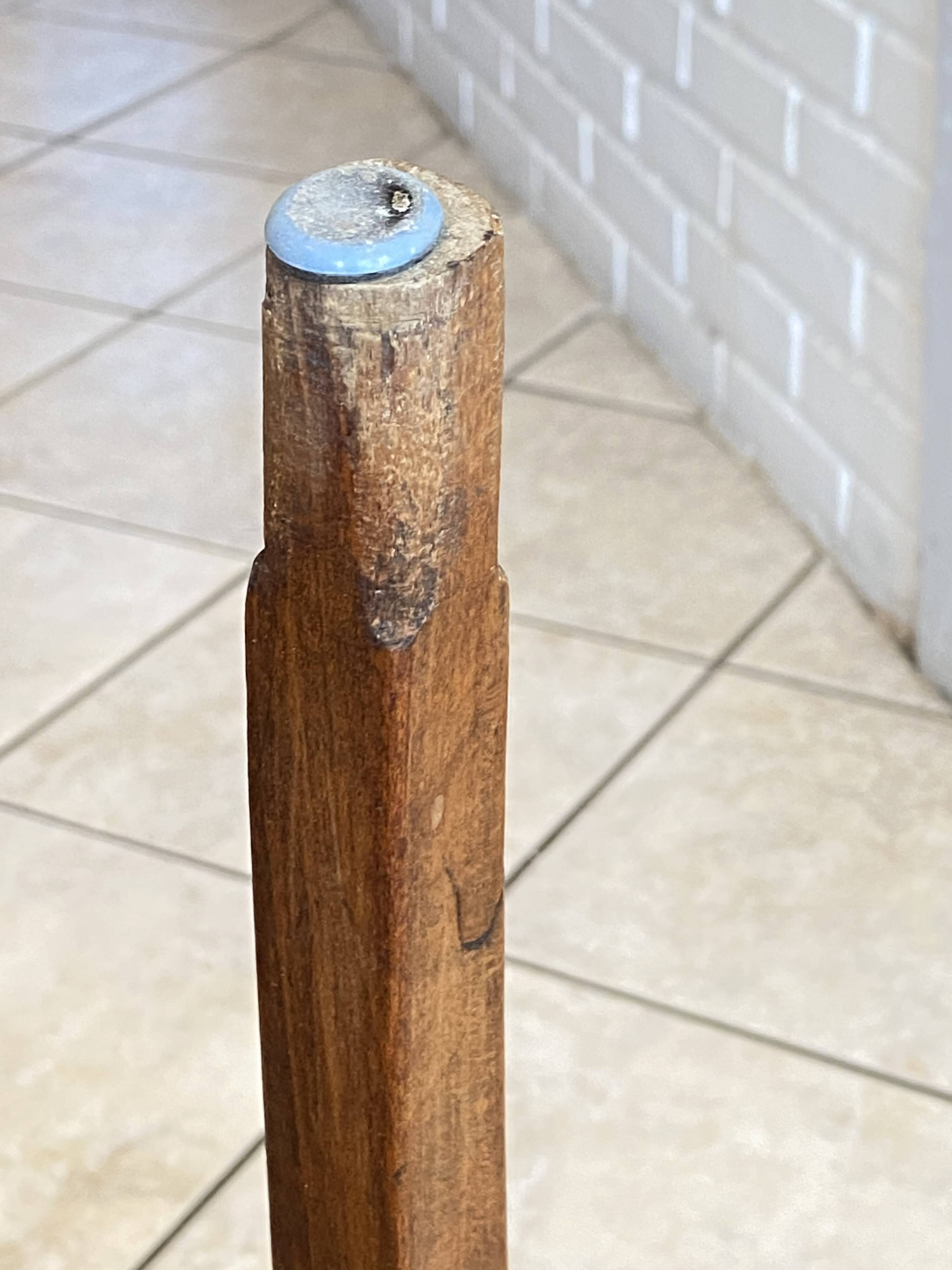 Bistro chair with a curved wooden frame and caned seat from the 1930s.