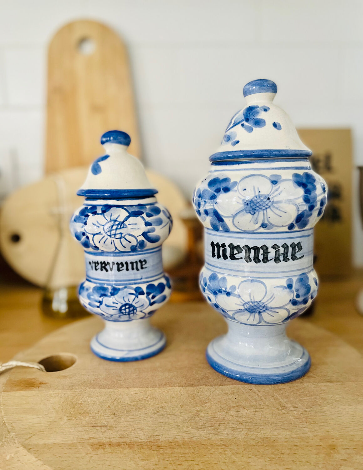 Set of two vintage painted ceramic apothecary pots