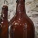 Set of 10 bottles of old Bordeaux French wine in ruby brown glass, 19th century.