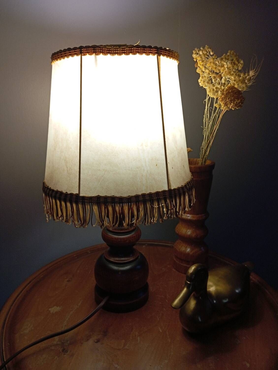 Rustic turned wood table lamp with vintage leather shade