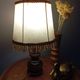 Rustic turned wood table lamp with vintage leather shade