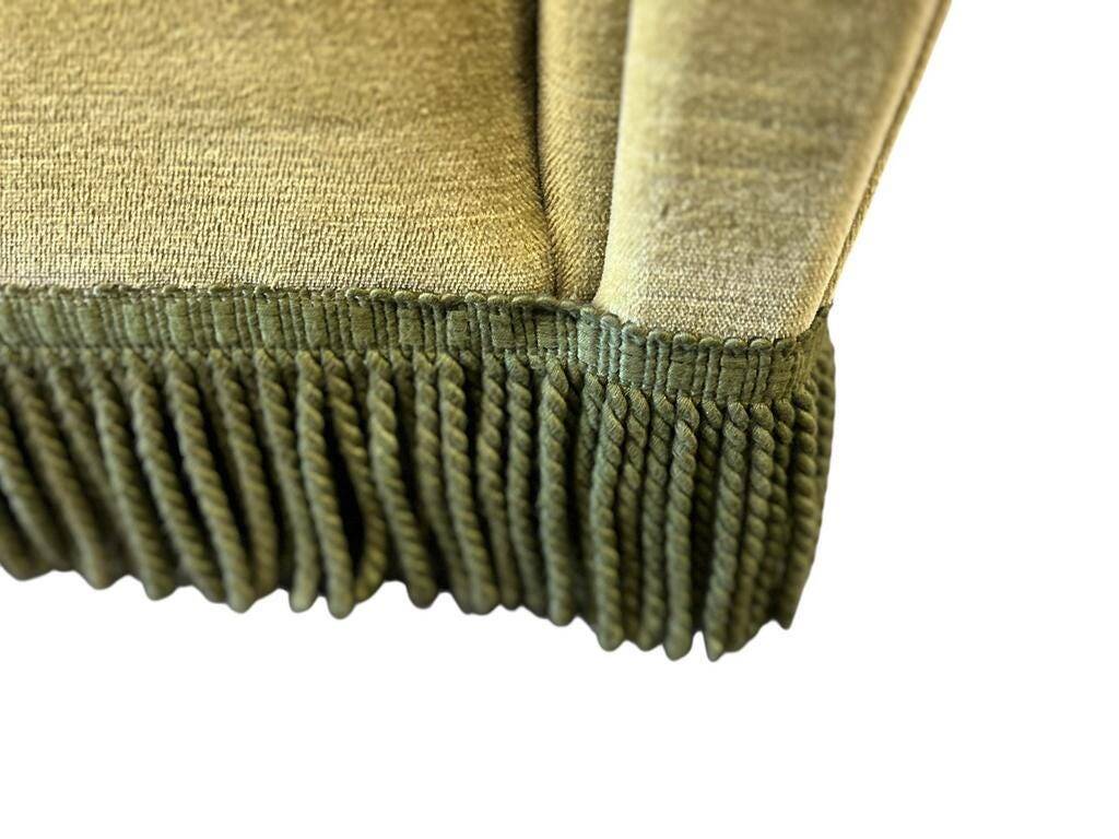 Vintage yellow-green fringed three-seater sofa