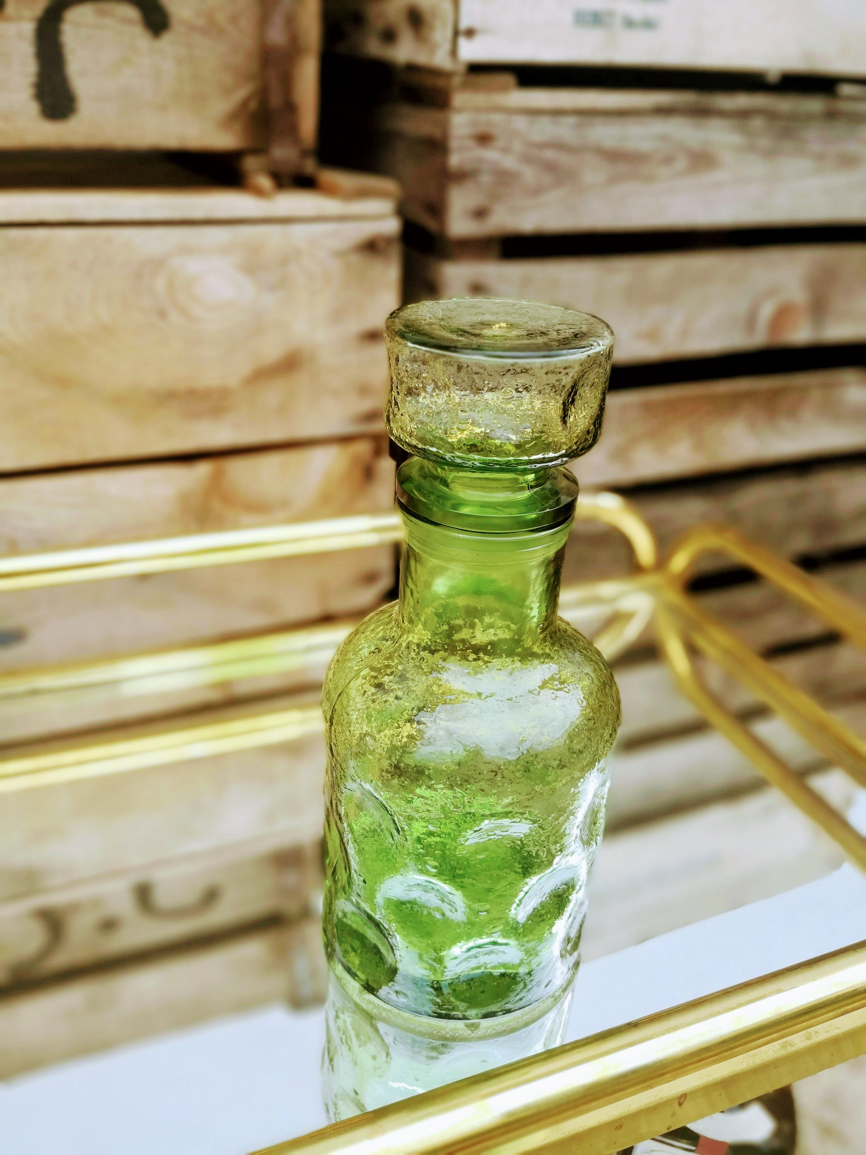 Green molded glass carafe