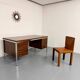 Vintage desk with rosewood veneer and chrome metal design from the 1970s.