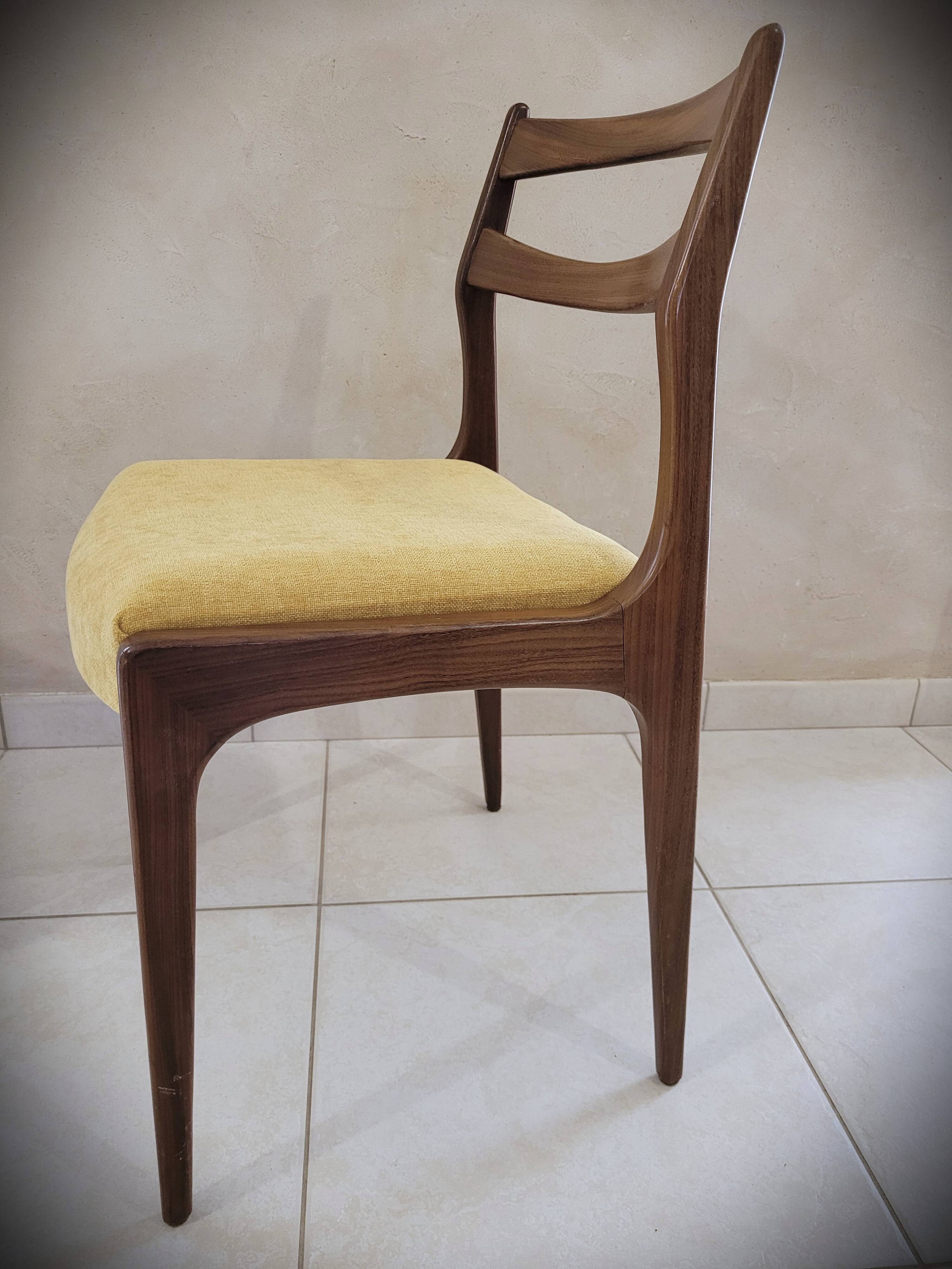 Set of 4 teak chairs with fabric seat in Scandinavian style.
