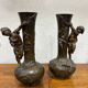 Paire de vases en régule signés JF Moreau, vers 1900