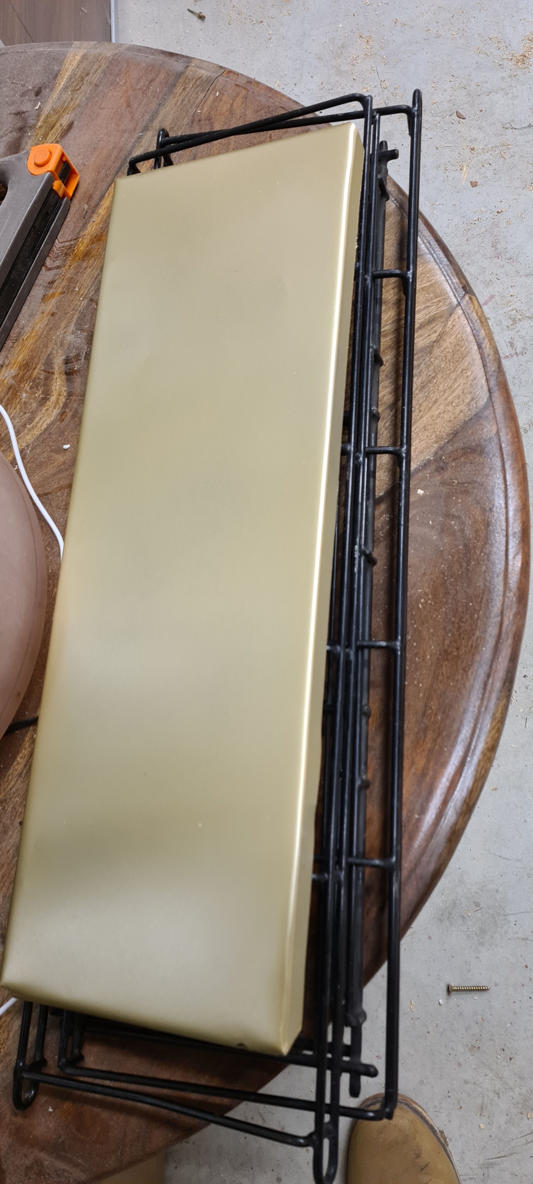 Bronze and black metal shelf 1970