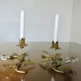Pair of gilded metal candle holders and tassels