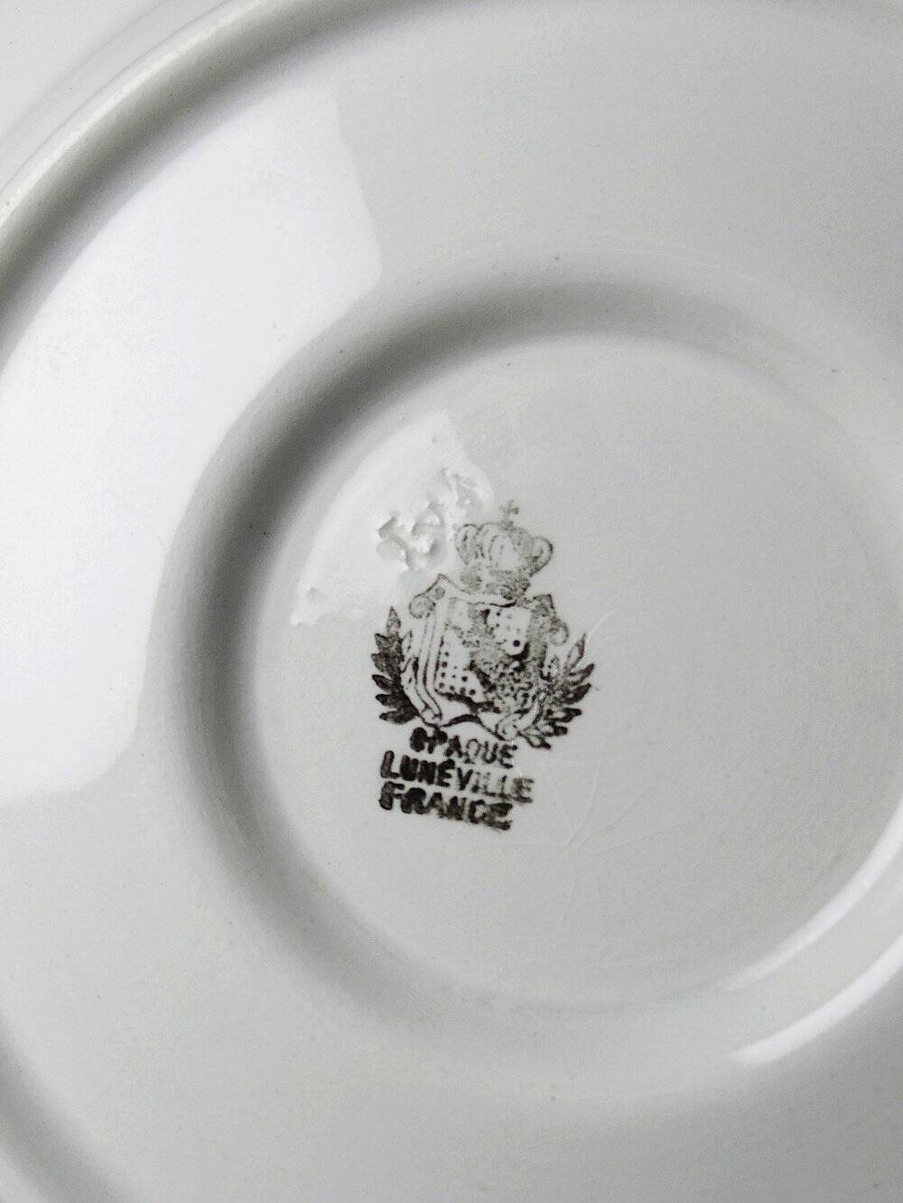 Old Luneville sauce boat, opaque porcelain with polychrome decoration.